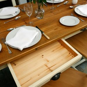 Provence table and open drawer within table
