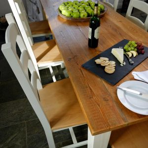 reclaimed wood table set for cheese and biscuits
