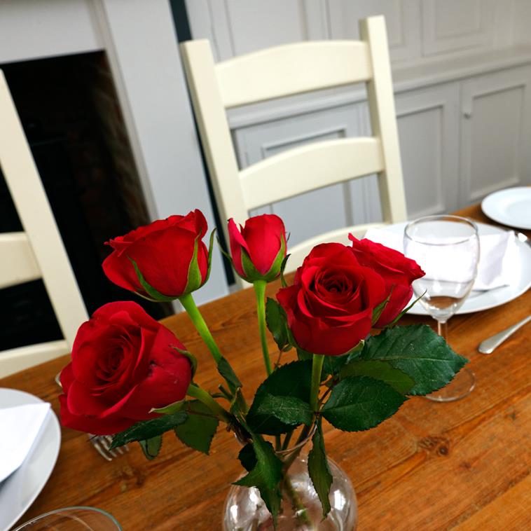 roses on provence rustic wood table