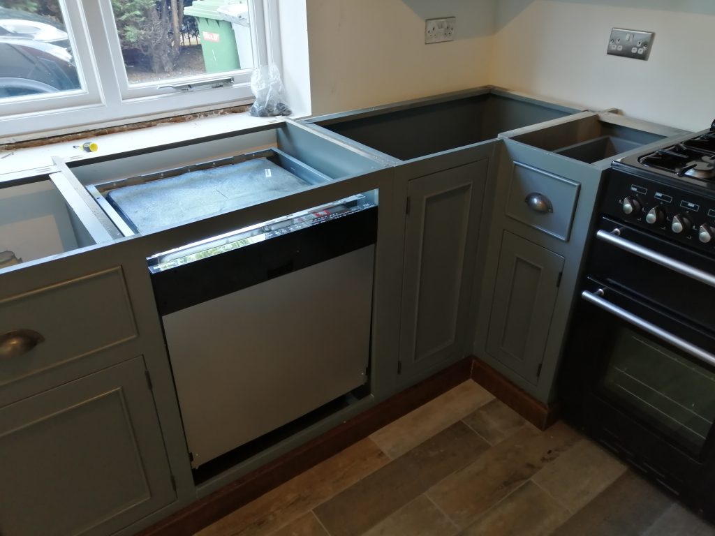 Reclaimed wood units fitted with integral appliances fitted