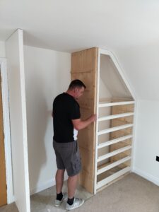 Custom-made bespoke fitted wardrobes in a modern bedroom
